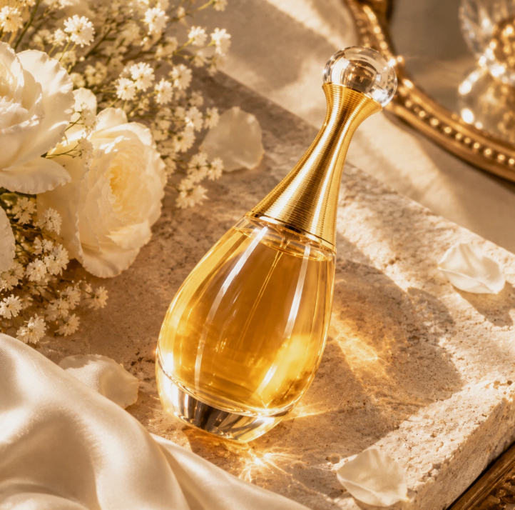 Dior J'adore EDP bottle close up with flowers