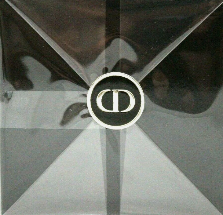 Dior Poison EDT bottle top view with CD logo